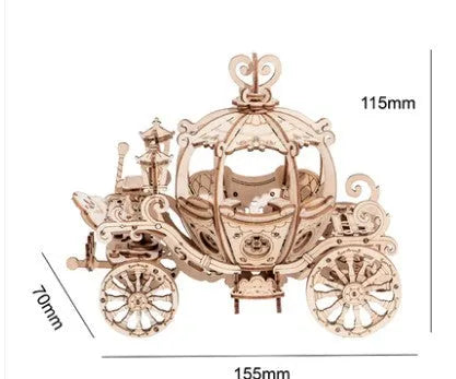 Assembled wooden 3D puzzle model of a Pumpkin Carriage on a white surface, laser-cut plywood construction