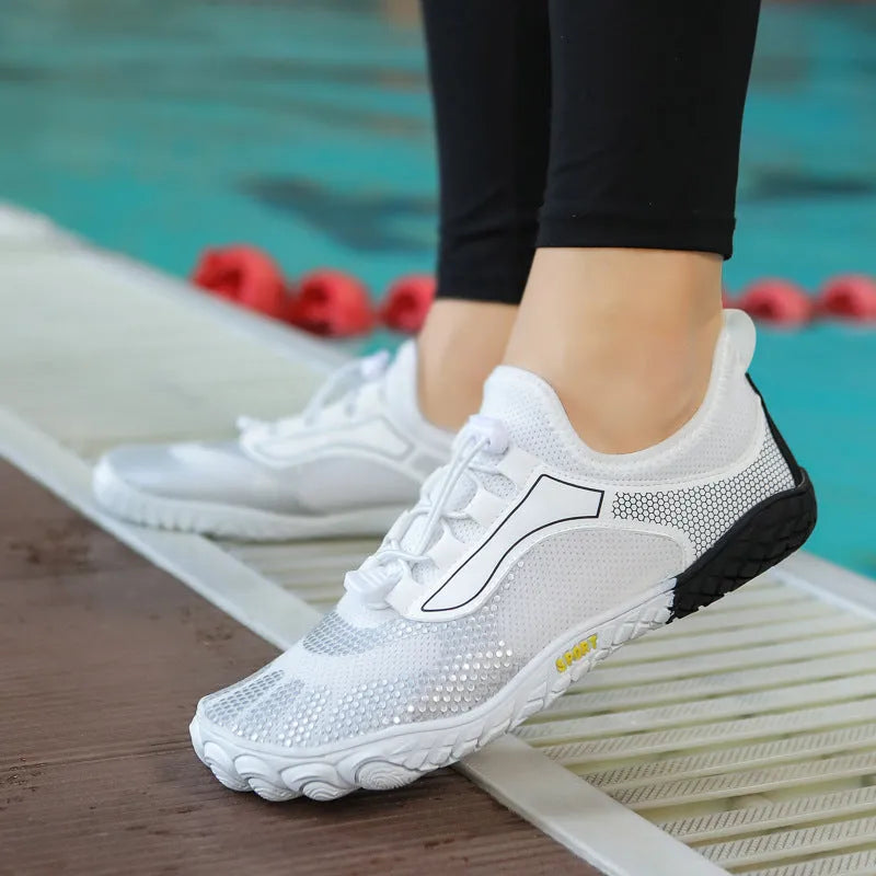 Pair of upstream shoes in 2303 Black with non-slip rubber sole and elastic fabric upper