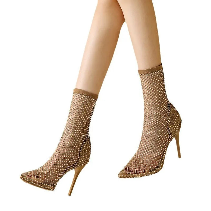 Gold high heel sandals with mesh upper and pointed stiletto design