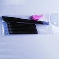Portable fading ink pen set with 0.5mm tip, plastic body, and 8 refill cores