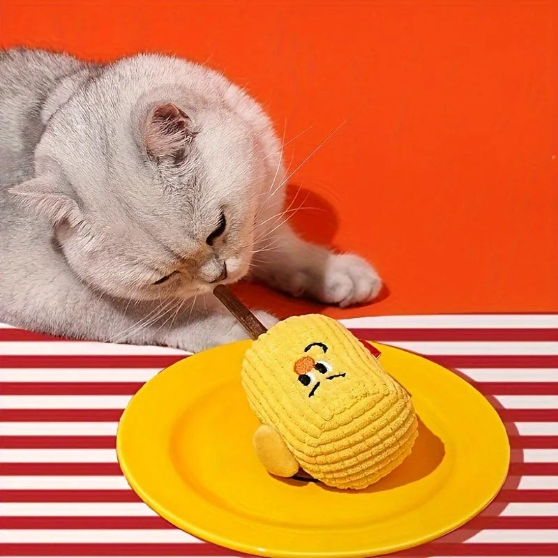 Polio wood corn cob shaped cat chew toy for dental health on a white background.