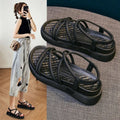 Women's black Roman platform sandals with round toe and slip-on sleeve design