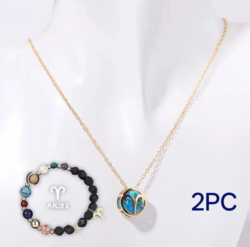 A natural stone beaded necklace and matching bracelet set laid flat, showing the textured stone beads.