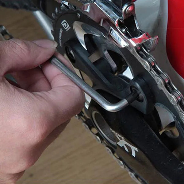 Set of four stainless steel bicycle repair multi-tools including TT2543, TT2536 gold, TT2536 black, and TT2552 9-function