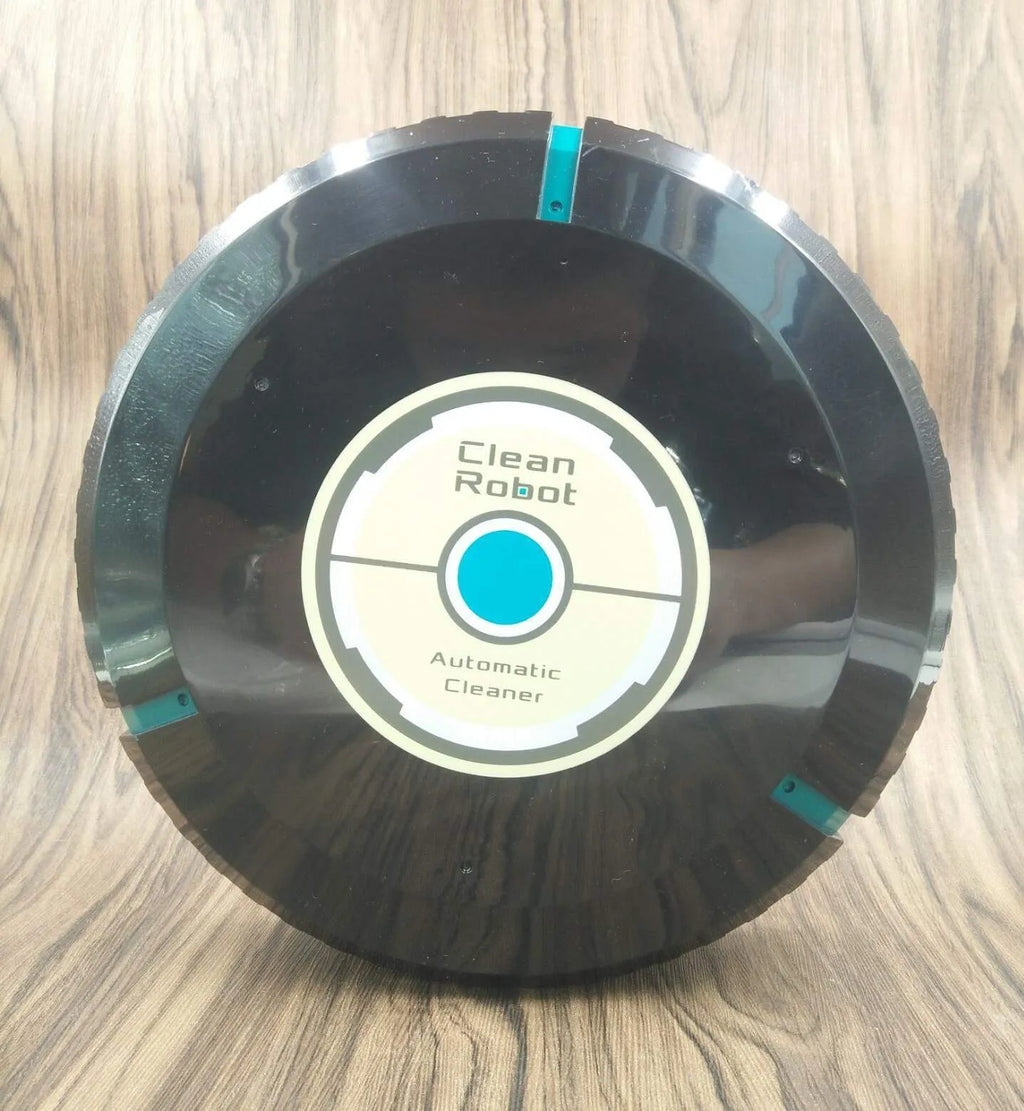 Black automatic robot vacuum cleaner on a wooden floor