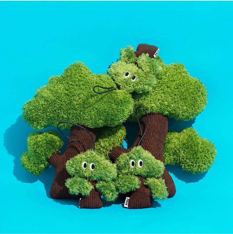 Pine tree shaped hanging cat toy with textured surface and bag of catnip.