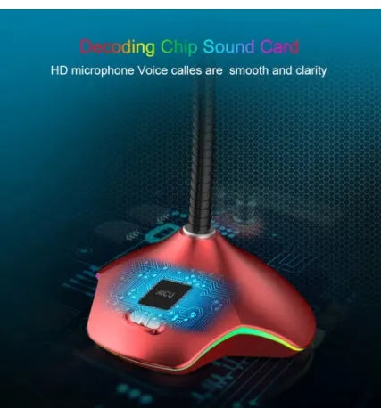 Black wired microphone with adjustable stand and foam windscreen on a desk.