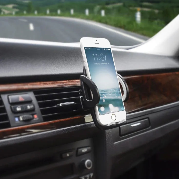 Black plastic car air conditioning outlet mobile phone holder mounted in vehicle vent