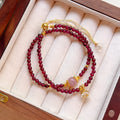 Natural garnet women's bracelet with double ring design and genuine stones