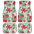 Black four-piece rubber car foot mat set with textured surface, shown on a car floor.