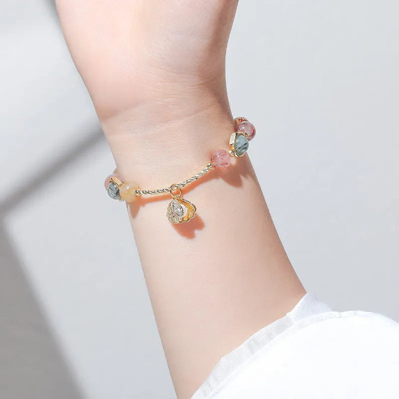 Women's crystal bracelet with colourful shell or red flower design and animal/Zodiac cartoon modelling.