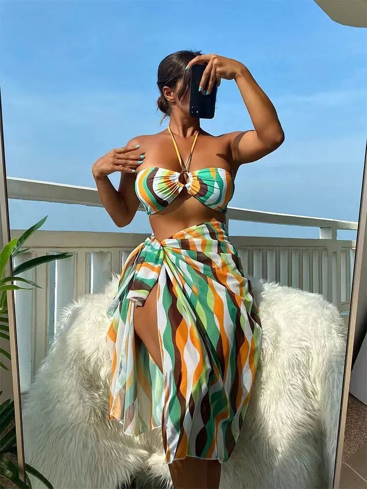 Women's printed bikini three-piece set with cover-up skirt in yellow green, magenta, or purple colours