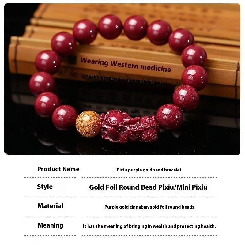 Polished cinnabar and Purple Gold Sandstone bracelet with totem design on wrist.