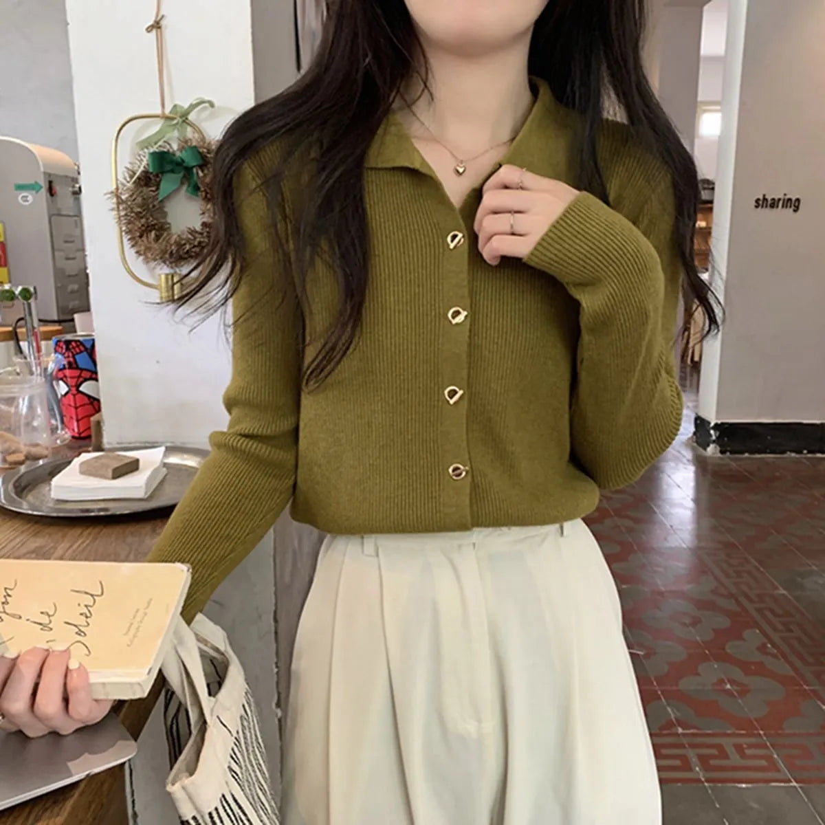 Women's loose fit long-sleeved knitted cardigan in viscose fibre, shown in beige colour