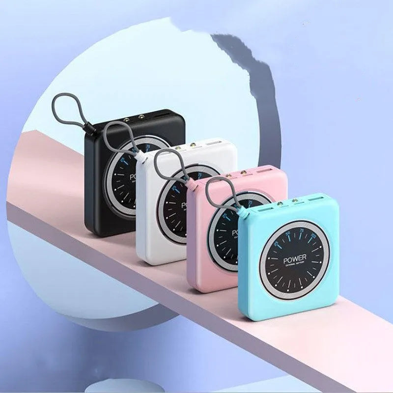 Mini clock charger power bank in mint green showing multiple USB ports and compact alloy case.