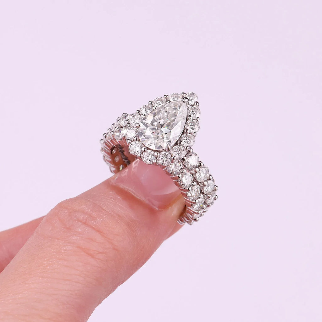 Love ring with pear-shaped moissanite on S925 silver band platinum-plated finish sizes 5 to 9