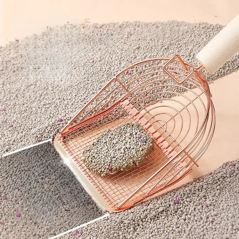 Stainless steel cat litter scoop with wooden handle showing screened design for efficient waste removal