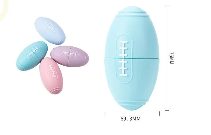 Coloured silicone rugby ball dog chew toy with treat-dispensing holes in blue, pink, purple options