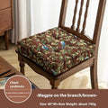 Square American-style dining chair cushion with pp cotton filler, shown in apricot floral bird print.