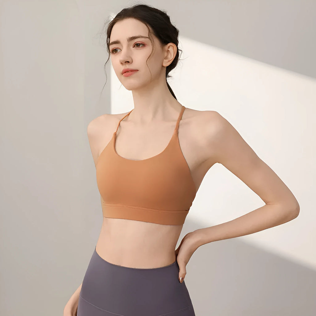 Women's nylon sports vest with double shoulder straps in various colours for athletic activities