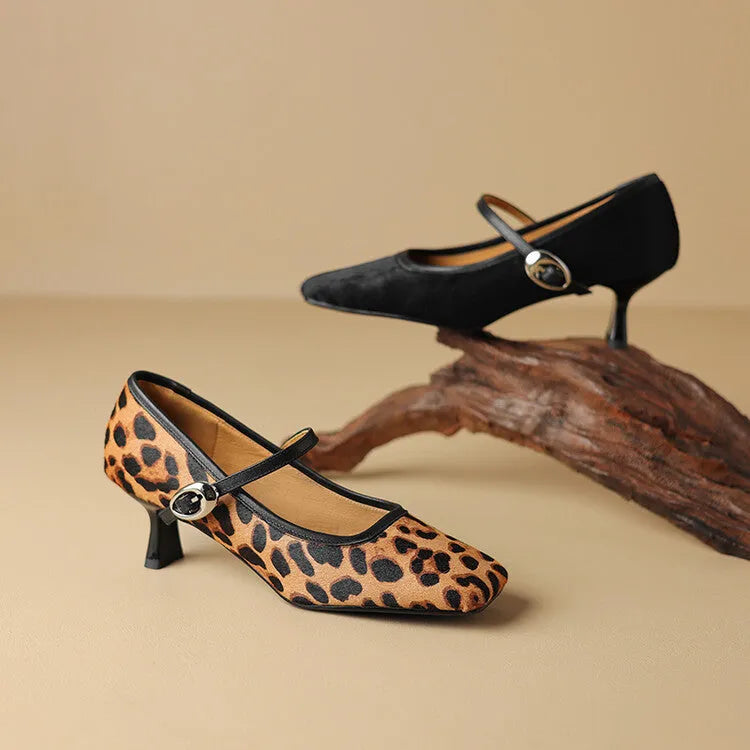 Black square toe stiletto ankle-strap heels with horse hair upper and buckle closure