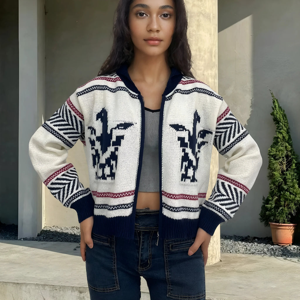 White women's zip-front cardigan with lapel collar and contrasting jacquard stripe pattern on sleeve.