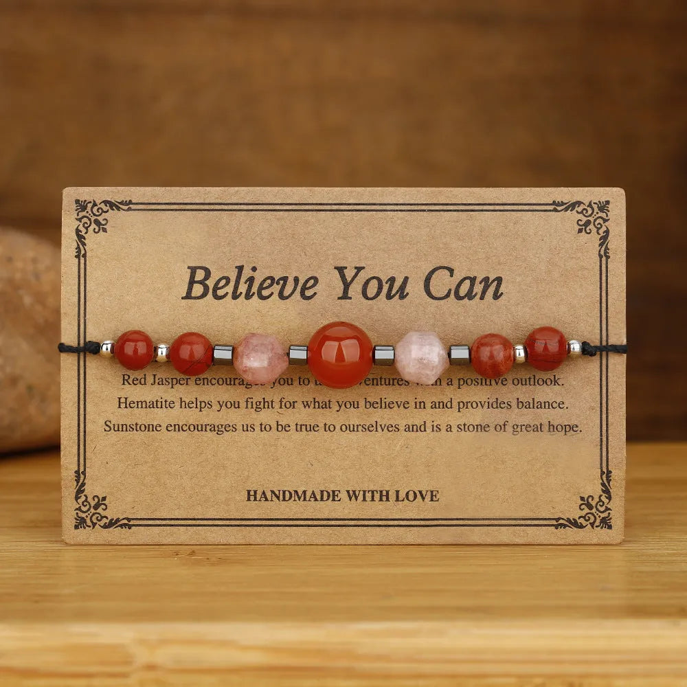 Handmade red crystal bracelet with sunstone, redstone and copper beads in a geometric design.