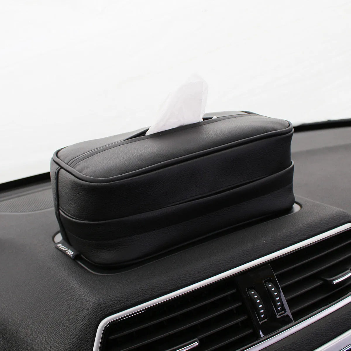 Black leather hanging storage box with a zip and PU strap, shown next to a beige medium sized box.