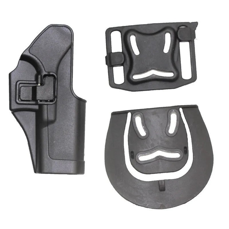 Black plastic tactical holster on plain background for duty carry use