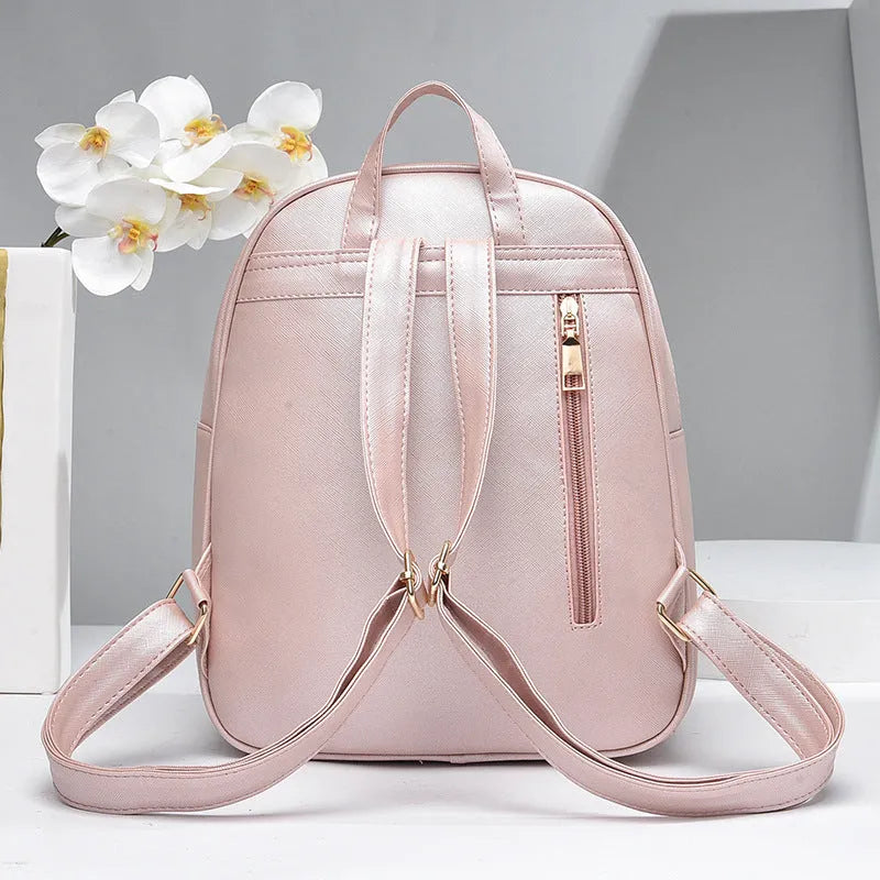 PU leather women's backpack set with bow plaid design in black, showing backpack, shoulder bag, and clutch