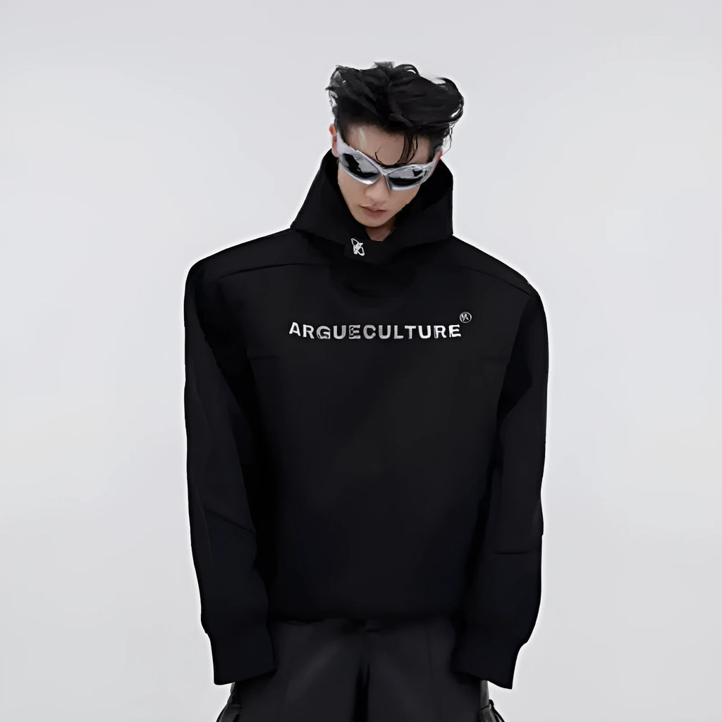 A loose red men's hooded sweater with heavy shoulder pads and metallic silver printing on the front.