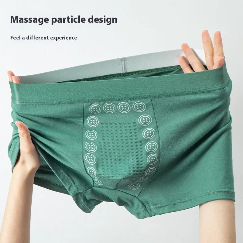Men's solid colour mid-waist underwear made from milk silk fabric with integrated massage particles.