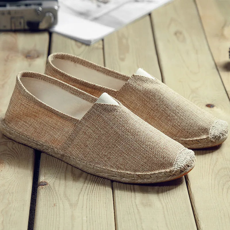 Men's solid colour canvas casual shoes with round toe in light brown.