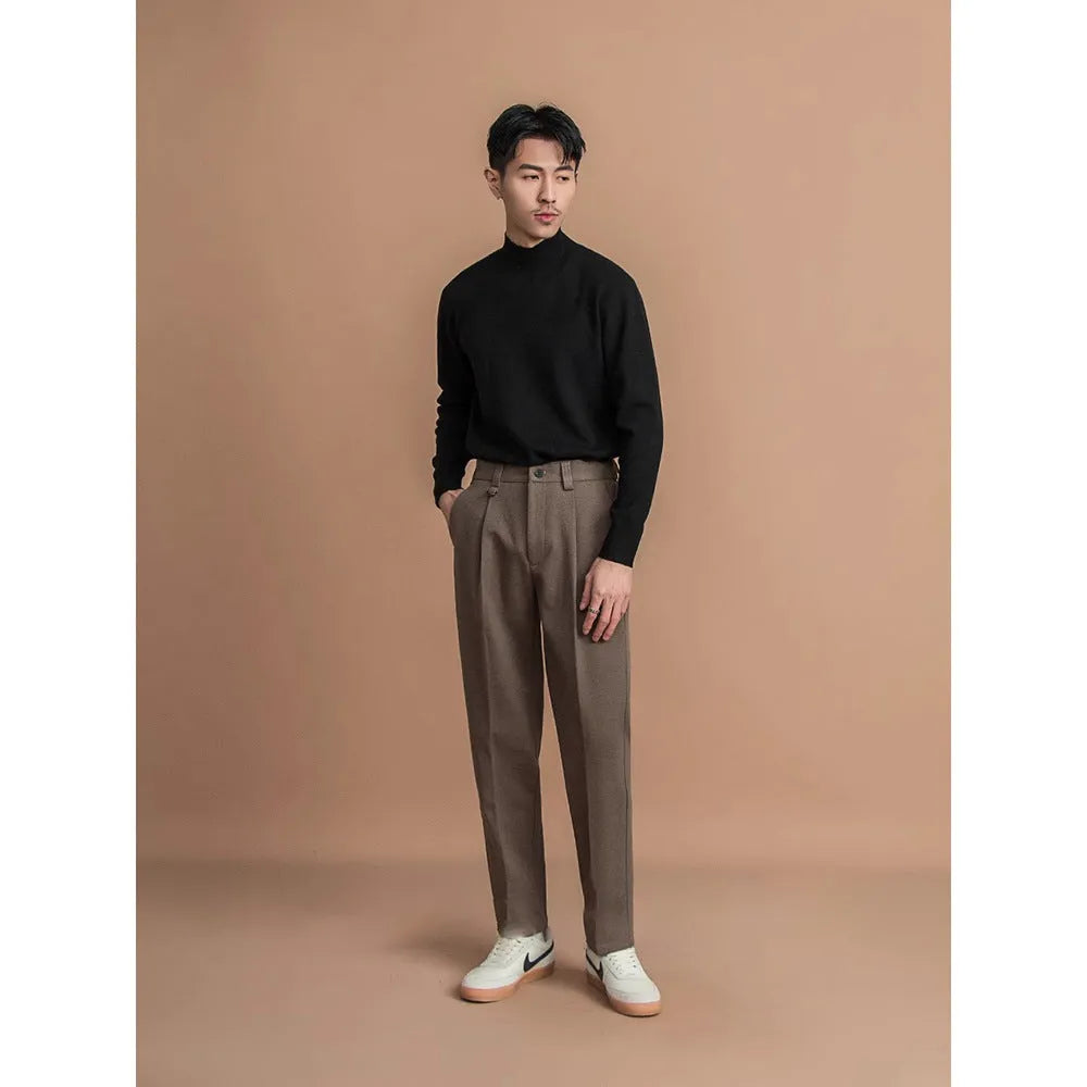 Men's straight-leg casual trousers in black with a draped design detail on the leg.
