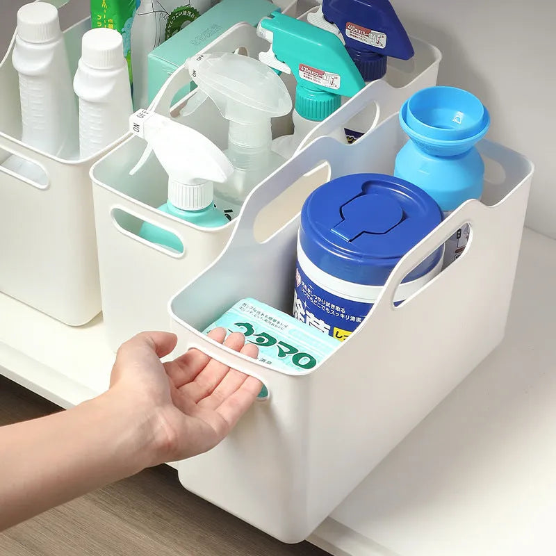 White PE plastic laundry detergent storage box with handle on a clean surface