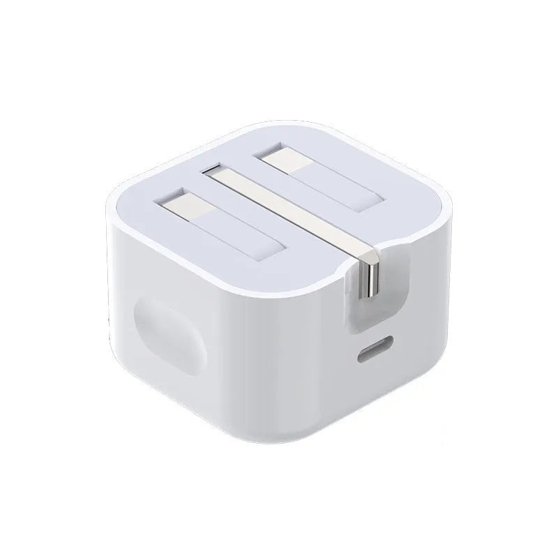 White 20W USB-C UK wall charger with a fixed three-pin plug and a USB-C cable.