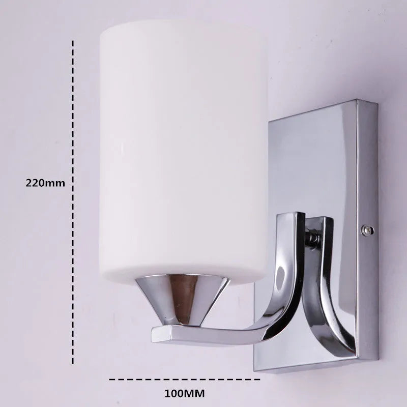 Modern chrome-finished wall lamp with a glass shade, shown in single-head and double-head configurations.