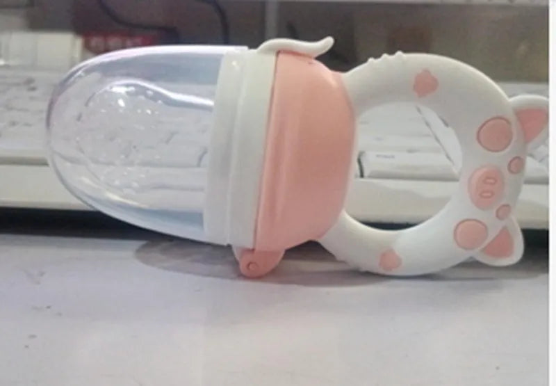Silicone baby teether in blue, green, or pink with textured mouthpiece for gum relief