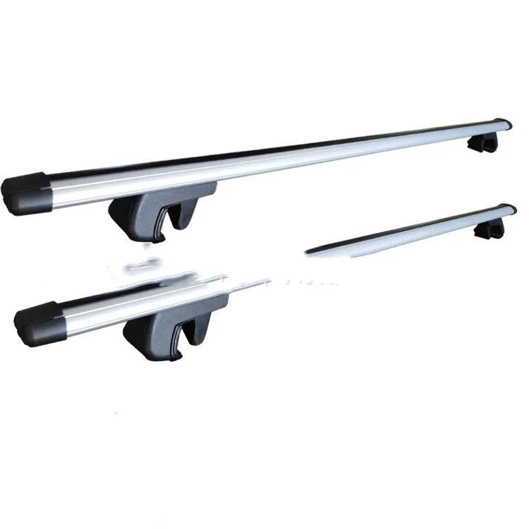 Black alloy GM SUV roof rack cross bars set showing adjustable length on vehicle roof.