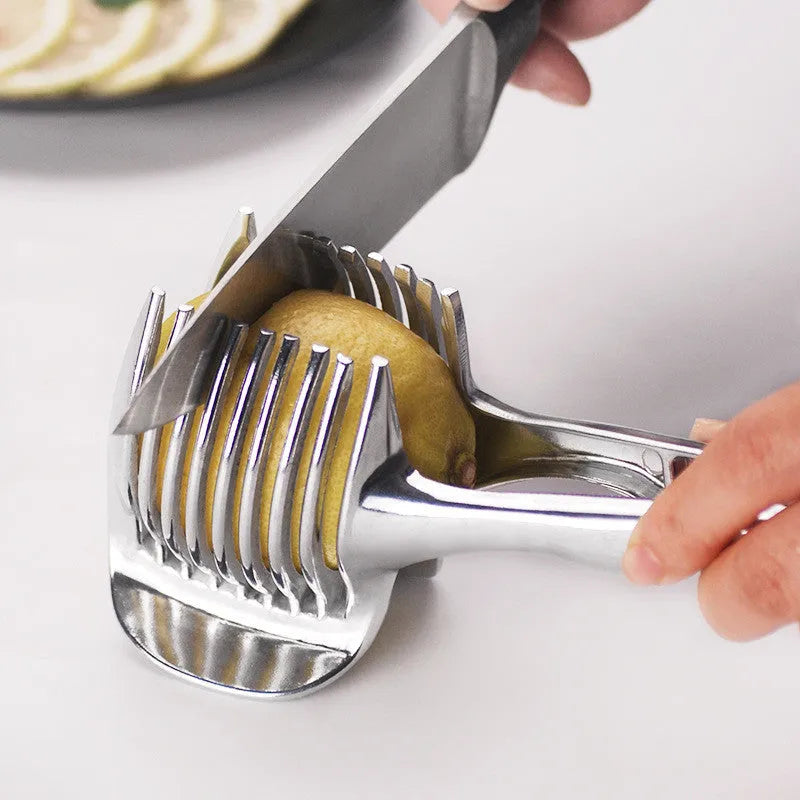 Silver plastic foldable lemon and fruit slicer kitchen gadget shown open for use
