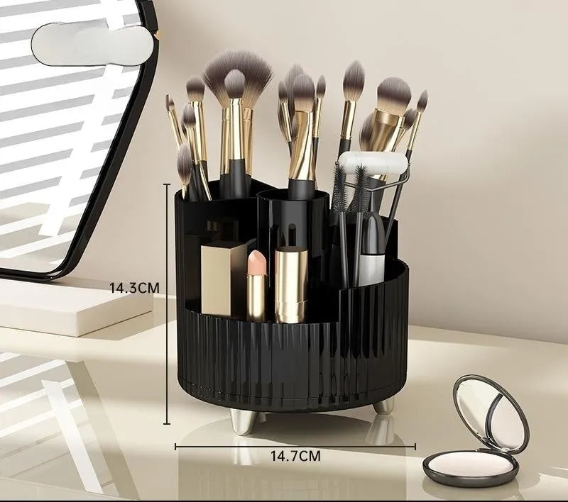 Rotating cosmetics storage box organiser for makeup brushes and lipsticks on a table.