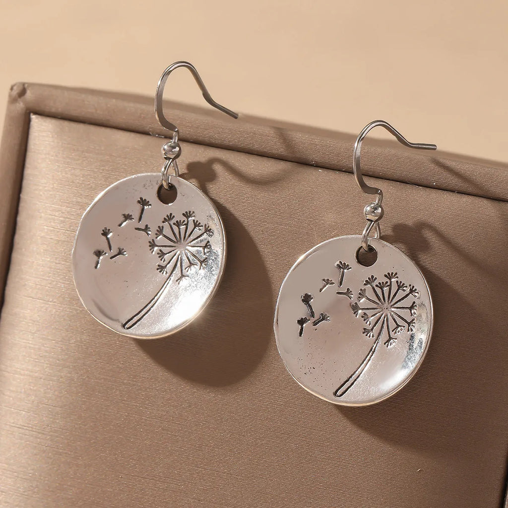 Round dandelion earrings in antique silver finish on zinc alloy for women