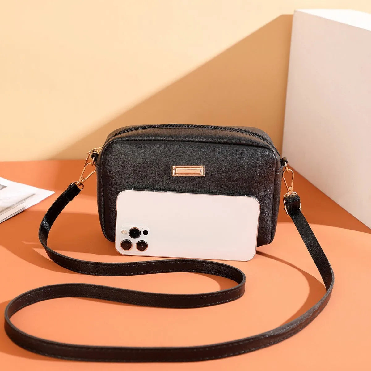 Solid colour PU ladies' shoulder bag in horizontal square shape with three-dimensional pocket.