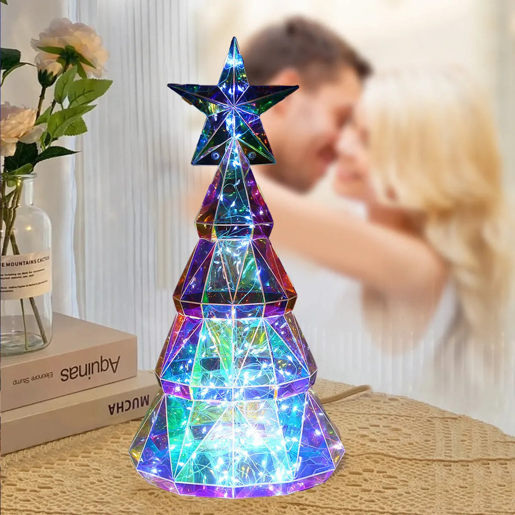 Colourful cartoon-style Christmas tree LED light decoration measuring 20cm high.
