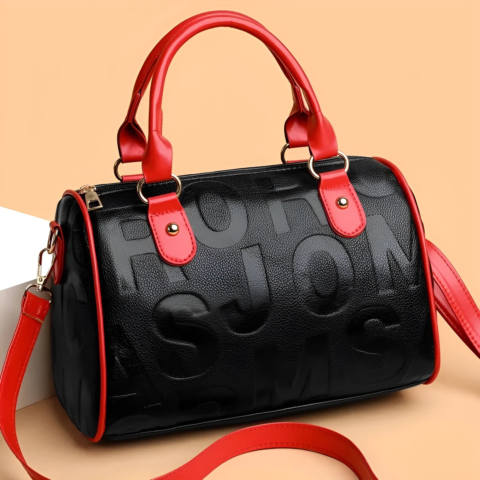 Brown cylindrical crossbody bag with three adjustable shoulder straps showing suitcase shape