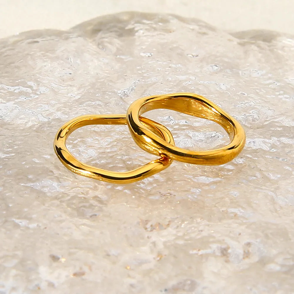 Stainless steel irregular wave ring with electroplated colour finish on hand