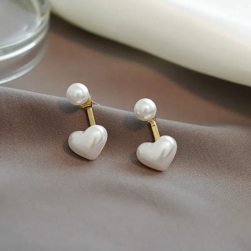 Korean style heart-shaped pearl stud earrings with alloy setting and inlaid gemstones