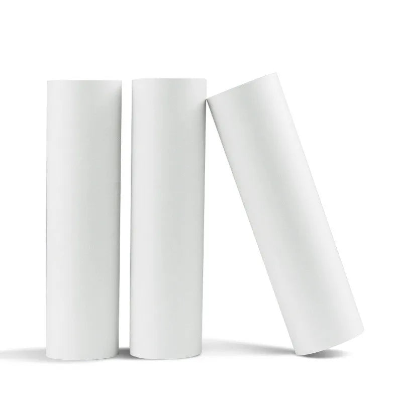 Three rolls of 110mm x 30mm thermal paper with adhesive backing on a white surface