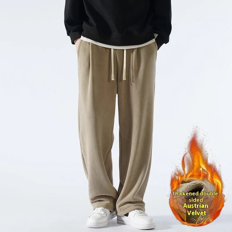 Men's apricot coloured double-sided polar fleece winter pants with a loose fit and drawstring waist.