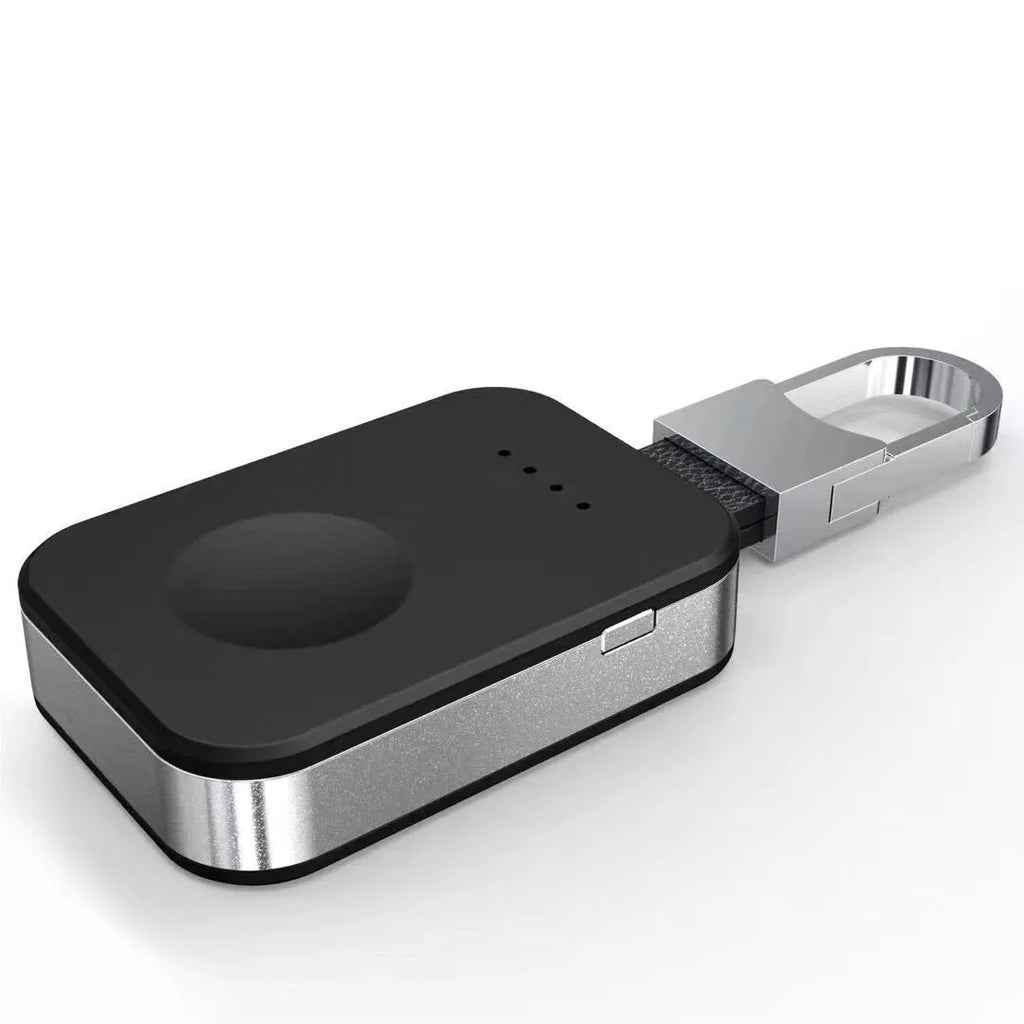 Black Apple Watch wireless power bank with keychain attachment showing compact rectangular design